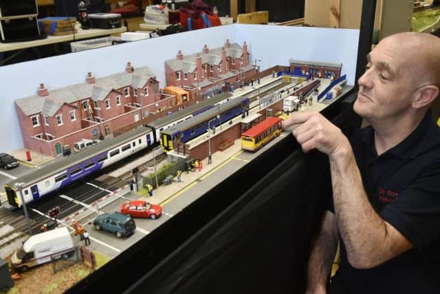 Shaun Taylor, of Howden, with his layout fictional West Street Station OO gauge with a modern image.