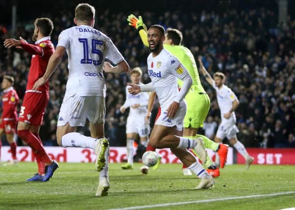 Goal: Kemar Roofe celebrates  his controversial equaliser.
 Picture: Bruce Rollinson