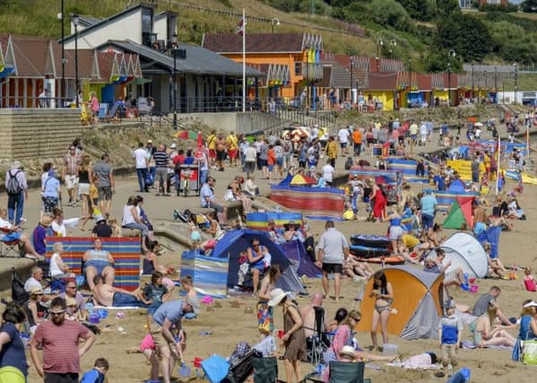©Tony Bartholomew
07802 400651
mail@bartpics.co.uk
5th August 2018
Scarborough's North Bay on a busy weekend at the Yorkshire Coast as people headed for the beach for sea breezes and a paddle to keep them cool.