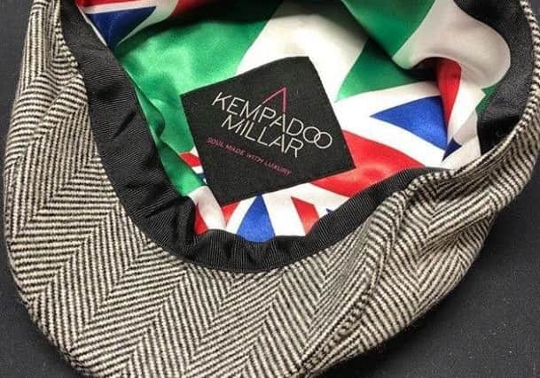 Joshua opted for a blend of the British and Nigerian flags digitally printed on the lining and his AJBXNG embroidered logo on the back of his flat cap.