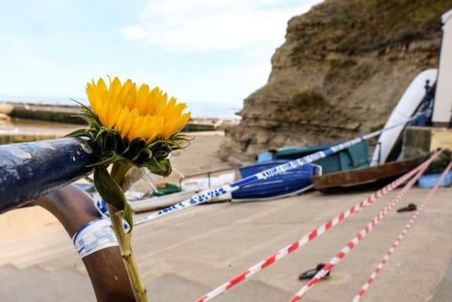 A flower left at the scene of the incident for Harriet Forster