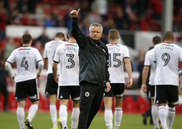 PROPER GGROUND: Sheffield United manager Chris Wilder acknowledges the away fans following last years Championship encounter at Nottingham Forests City Ground.  Picture: Simon Bellis/Sportimage