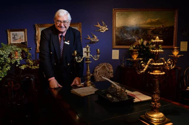 David Harvey with antique furniture at the Harrogate fair. Picture: Bruce Rollinson