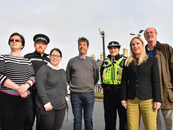 Inspector Martin Dennison (pictured second from left) and Martin Dales (first from right) with members of Ryedale Cameras in Action alongside upgraded CCTV on the A169-A170 roundabout in Pickering. Picture: RCIA.