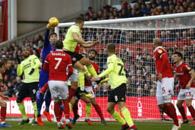 Nottingham Forest goalkeeper Costel Pantilimon clears the ball under pressure from Sheffield United's Billy Sharp (Picture: Simon Bellis/Sportimage).