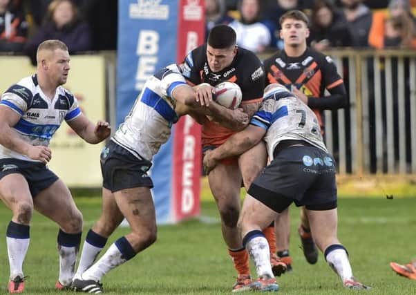 Mitch Clark in action for Castleford Tigers against Featherstone Rovers in last year's festive fixture. Picture: Matthew Merrick