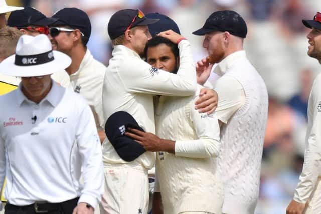 LEADING ROLE: Joe Root congratulates Adil Rashid on a wicket taken during the recent Test series against India, which England won 4-1. Picture: Anthony Devlin/PA