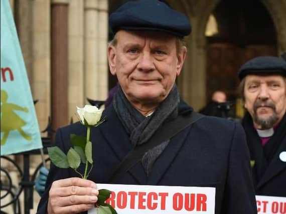 Pictured at an earlier demonstration, Paul Andrews with campaigners outside the Royal Courts of Justice in London. Photo: Charlotte Ball/PA Wire