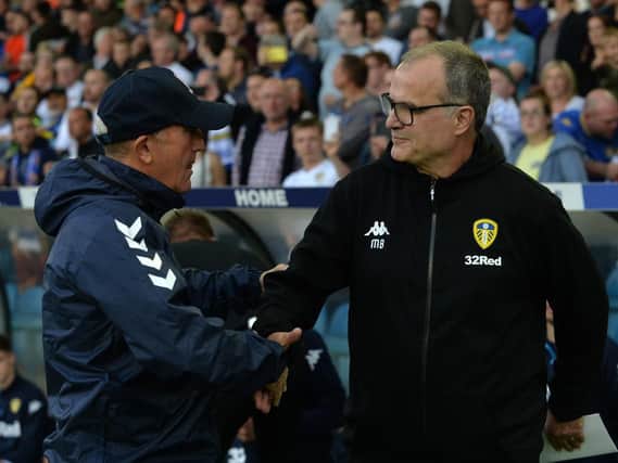 Leeds United manager Marcelo Bielsa pictured with Middlesbrough Tony Pulis