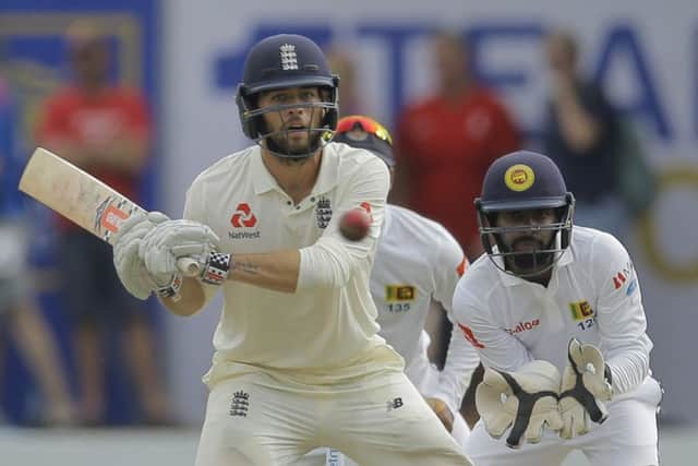 England's Ben Foakes plays a shot during the first day of the first test cricket match between Sri Lanka and England, in Galle, Sri Lanka. (AP Photo/Eranga Jayawardena)