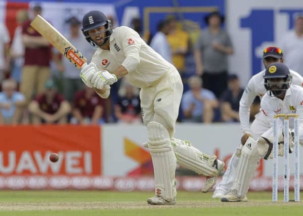 England's Ben Foakes plays a shot during the first day of the first test cricket match between Sri Lanka and England, in Galle, Sri Lanka. (AP Photo/Eranga Jayawardena)