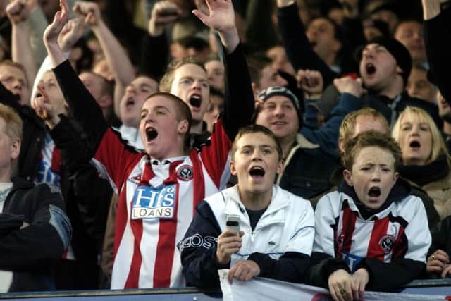 Sheffield United fans celebrate the win over Sheffield Wednesday on 18th February 2006.