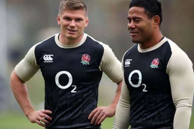 England's Owen Farrell (left) and Manu Tuilagi during the training session at Pennyhill Park.
