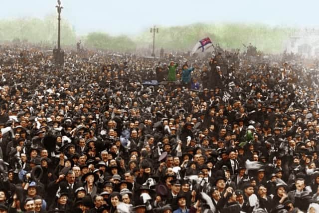 Enhanced technology, such as this colour photo of the scene outside Buckingham Palace following the signing of the Armistice, have brought the First World War to life to younger generations.