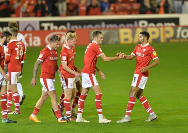 Barnsley's Ryan Hedges, second right, celebrates his goal against Everton Under-21s on Tuesday night.  Picture: Bruce Rollinson