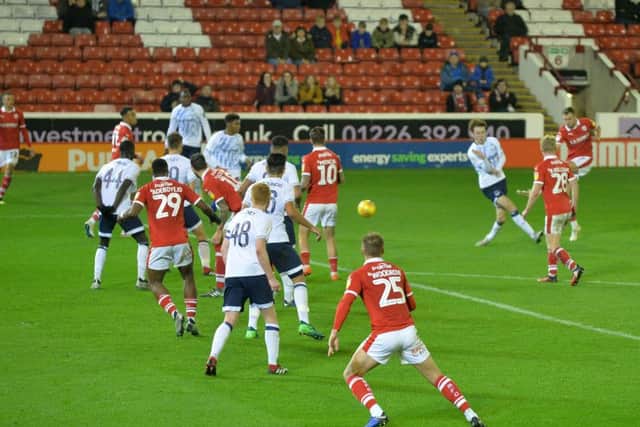 Ryan Hedges scores against Everton Under-21s on Tuesday night at Oakwell. Picture: Bruce Rollinson