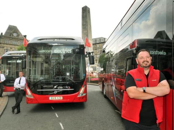 Alex Hornby (right) Chief Executive of Transdev with some of the new electric buses when they were launched back in July.