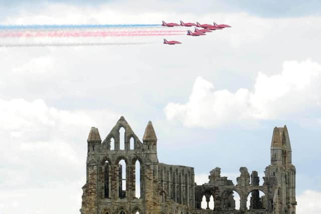 The Red Arrows pictured over Whitby Abbey in 2012.