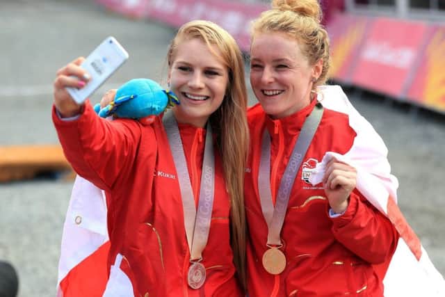 England's Evie Richards (silver) and Annie Last (gold) take a selfie with their medals after the Women's Cross-country at the Nerang Mountain Bike Trails during day eight of the 2018 Commonwealth Games in the Gold Coast, Australia. (Picture: Mike Egerton/PA Wire)