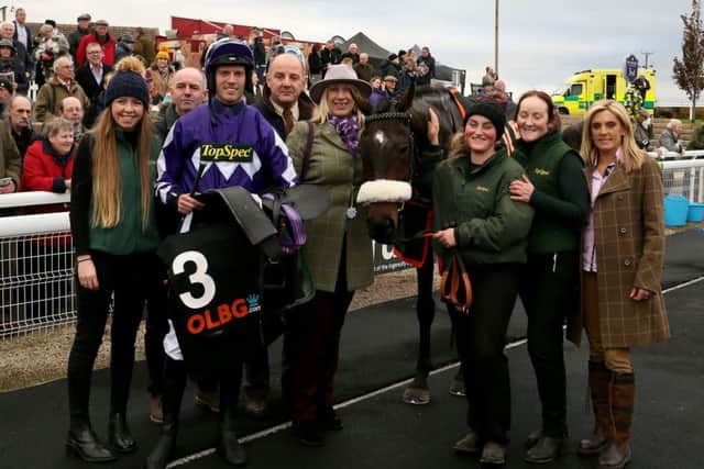 Comnnections of Lady Buttons celebrate the mare's win at Wetherby.