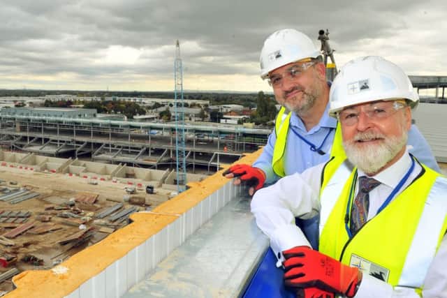 Jason McGill chairman of York City (right) and Neil Gulliver, general manager of York City Knights, overlooking The York Stadium Leisure complex that will open in Summer 2019.
