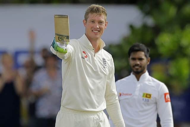 Well done: England's Keaton Jennings celebrates scoring a century during the third day of the first test cricket match between Sri Lanka and England in Galle (AP Photo/Eranga Jayawardena)