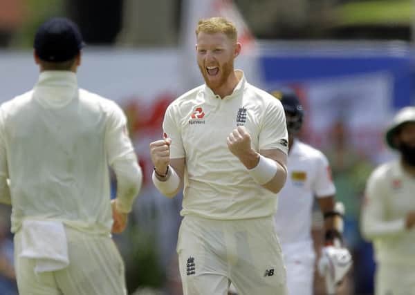 England's Ben Stokes celebrates taking the wicket of Sri Lanka's Dhananjaya de Silva during the fourth day of the first test. (AP Photo/Eranga Jayawardena)