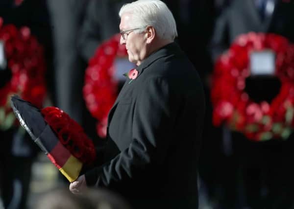 President of Germany Frank-Walter Steinmeier lays a wreath during the remembrance service at the Cenotaph memorial in Whitehall, central London, on the 100th anniversary of the signing of the Armistice which marked the end of the First World War.