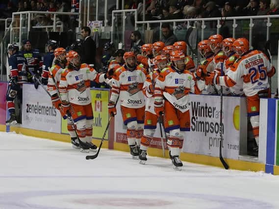 GOOD TRIP? Sheffield Steelers' players celebrate one of their six goals in Sunday's win at Dundee. Picture courtesy of Derek Black/EIHL.