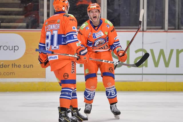 ON TARGET: Robert Dowd, seen celebrating his first goal against Guildford on Saturday night, finished the weekend with three goals and an assist. Picture: Dean Woolley.