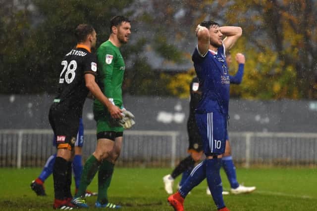 Metropolitan Police's Max Blackmore shows his frustration during his side's FA Cup first round defeat to Newport County at Imber Court on Saturday. Picture: Daniel Hambury/PA