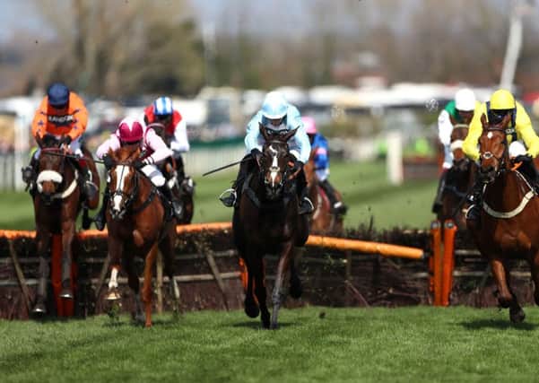 Black Op, ridden by Jockey Noel Fehily (centre), wins the Betway Mersey Novices' Hurdle at Aintree in April. Picture: Tim Goode/PA