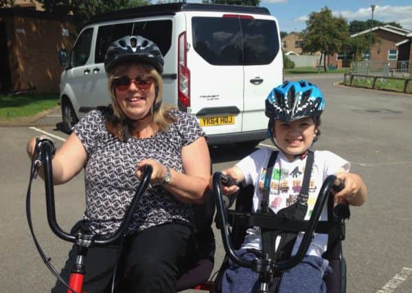 Caroline Shepherdson, a trustee for Ryedale Special Families, with her son Matthew at the charity's Yorkshire Wolds Cycle.