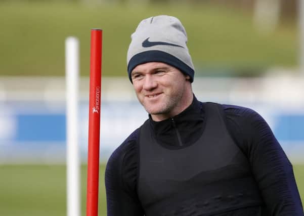 Bowing out with a tribute: England's Wayne Rooney during training at St George's Park.