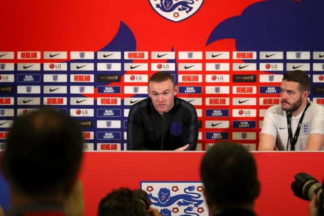 Wayne Rooney faced a grilling by the media on his return to England duty (Picture: PA).