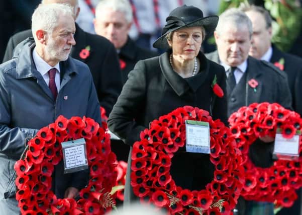 Jeremy Corbyn and Theresa May at the Cenotaph memorial in Whitehall