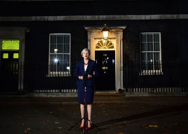 Prime Minister Theresa May makes a statement outside 10 Downing Street, London, confirming that Cabinet has agreed the draft Brexit withdrawal agreement. Picture: Victoria Jones/PA Wire
