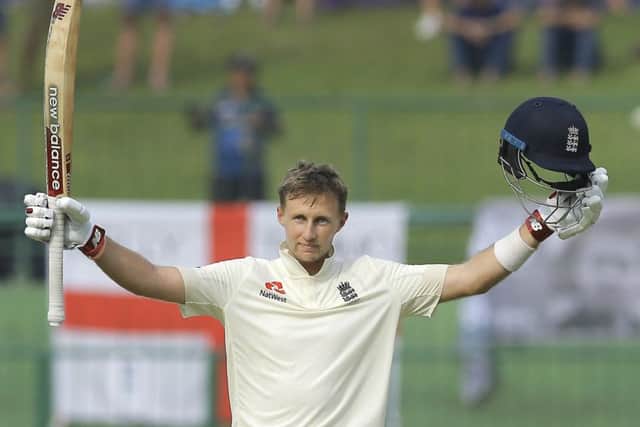 England's Joe Root celebrates scoring a century in England's second innings in Pallekele. Picture: AP/Eranga Jayawardena
