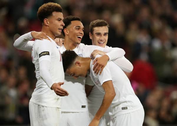 Future's bright: England's Trent Alexander-Arnold (2nd left) celebrates scoring his side's second goal of the game with team-mates Dele Alli (left), Jadon Sancho (2nd right) and Harry Winks during the International Friendly with the United States: (Picture: Nick Potts/PA Wire)