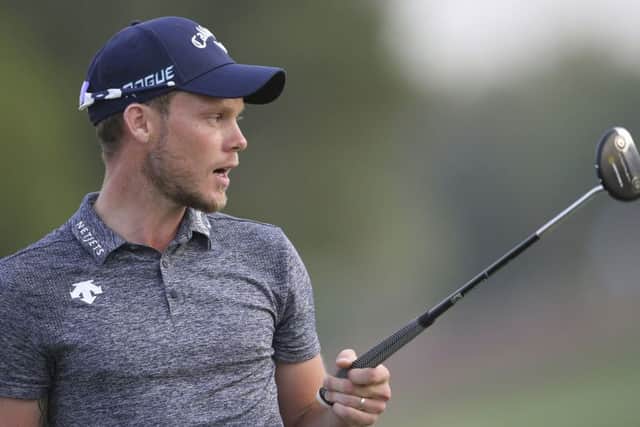 In the hunt: England's Danny Willett reacts on the 18th hole during the second round of the DP World Tour Championship golf tournament in Dubai, United Arab Emirates. (AP Photo/Kamran Jebreili)