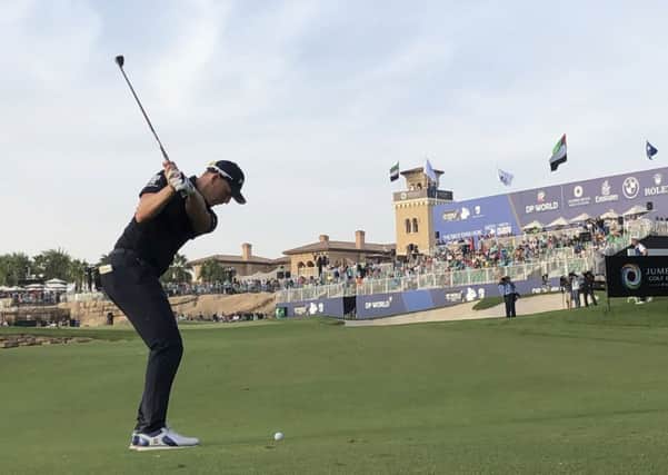 England's Matt Wallace plays a shot on the 18th hole during the second round of the DP World Tour Championship golf tournament in Dubai, United Arab Emirates. (AP Photo/Kamran Jebreili)