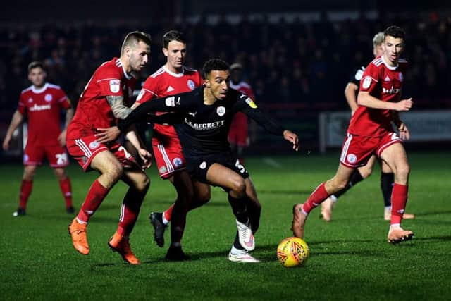 Barnsley's Jacob Brown looks for space against Accrington. Picture : Jonathan Gawthorpe