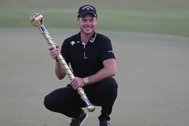 England's Danny Willett poses with the trophy after winning the DP World Tour Championship golf tournament in Dubai. Picture: AP/Kamran Jebreili