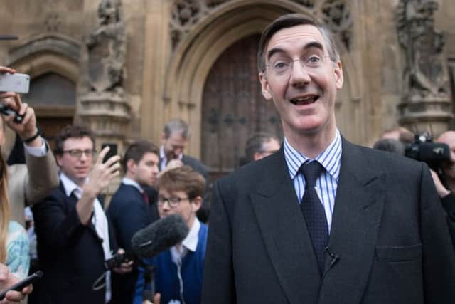 Conservative MP Jacob Rees-Mogg speaking outside the House of Parliament in London after he handed in his letter of no-confidence in Theresa May.