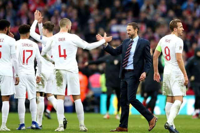 England manager Gareth Southgate (centre) celebrates after the final whistle with England's Eric Dier (4) and England's Harry Kane (right). Picture: Nick Potts/PA