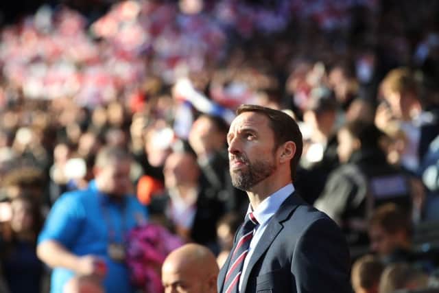 GIVE ME SUNSHINE: England manager Gareth Southgate looks to the heavens during his sides victory over Croatia. Picture: Nick Potts/PA