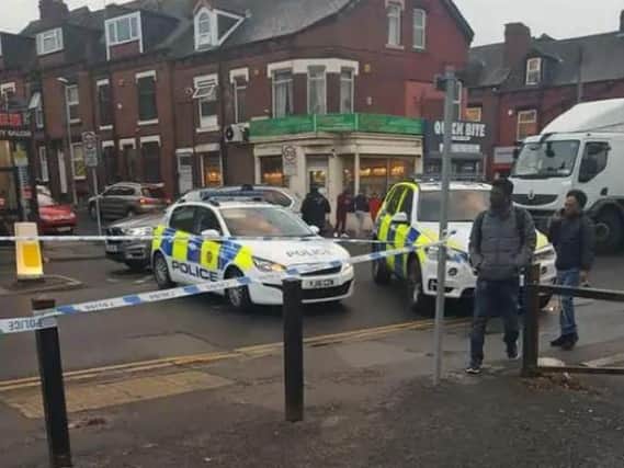 Police at the scene on Roundhay Road on Monday.
Photo: Lucy Lo