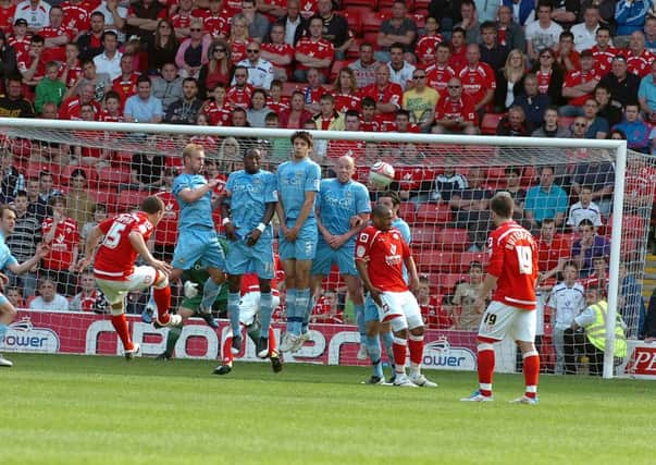 Barnsley's Kieran Trippier scores his team's late equalising goal in the November 2011 encounter at Oakwell. Picture: Tony Johnson.