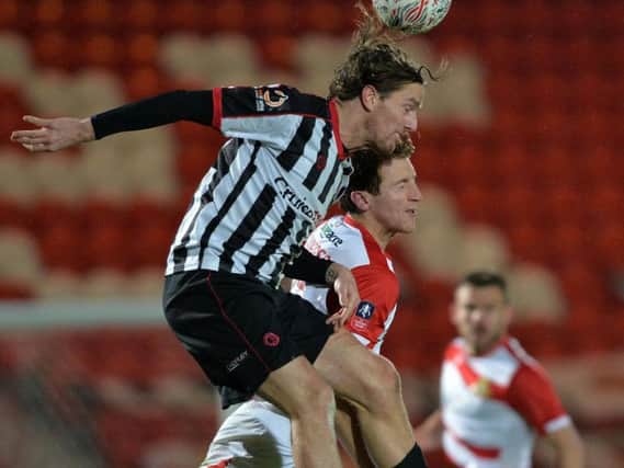 Doncaster Rovers defender Tom Anderson, who will miss the South Yorkshire derby at Barnsley.