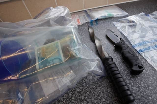 Items seized during a knife crime raid.